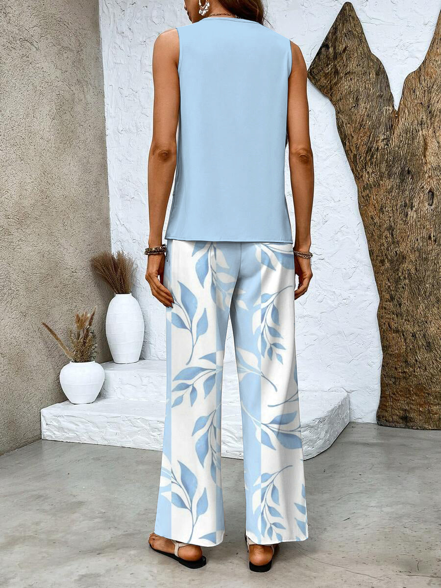 Alba | Conjunto de blusa e calça com estampa floral estilosa