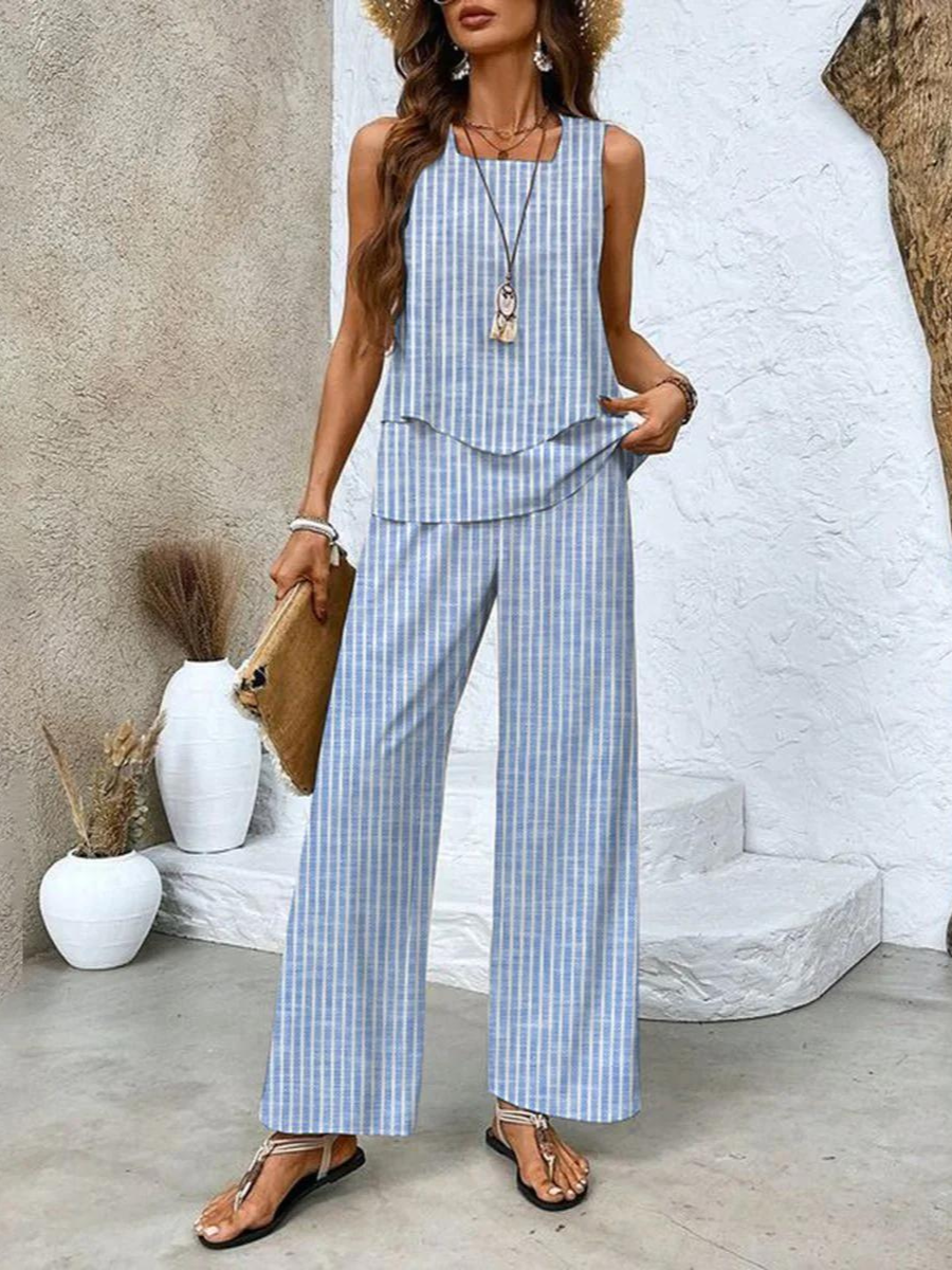 Alba | Conjunto de blusa e calça com estampa floral estilosa