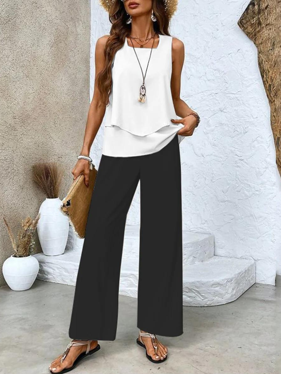 Alba | Conjunto de blusa e calça com estampa floral estilosa