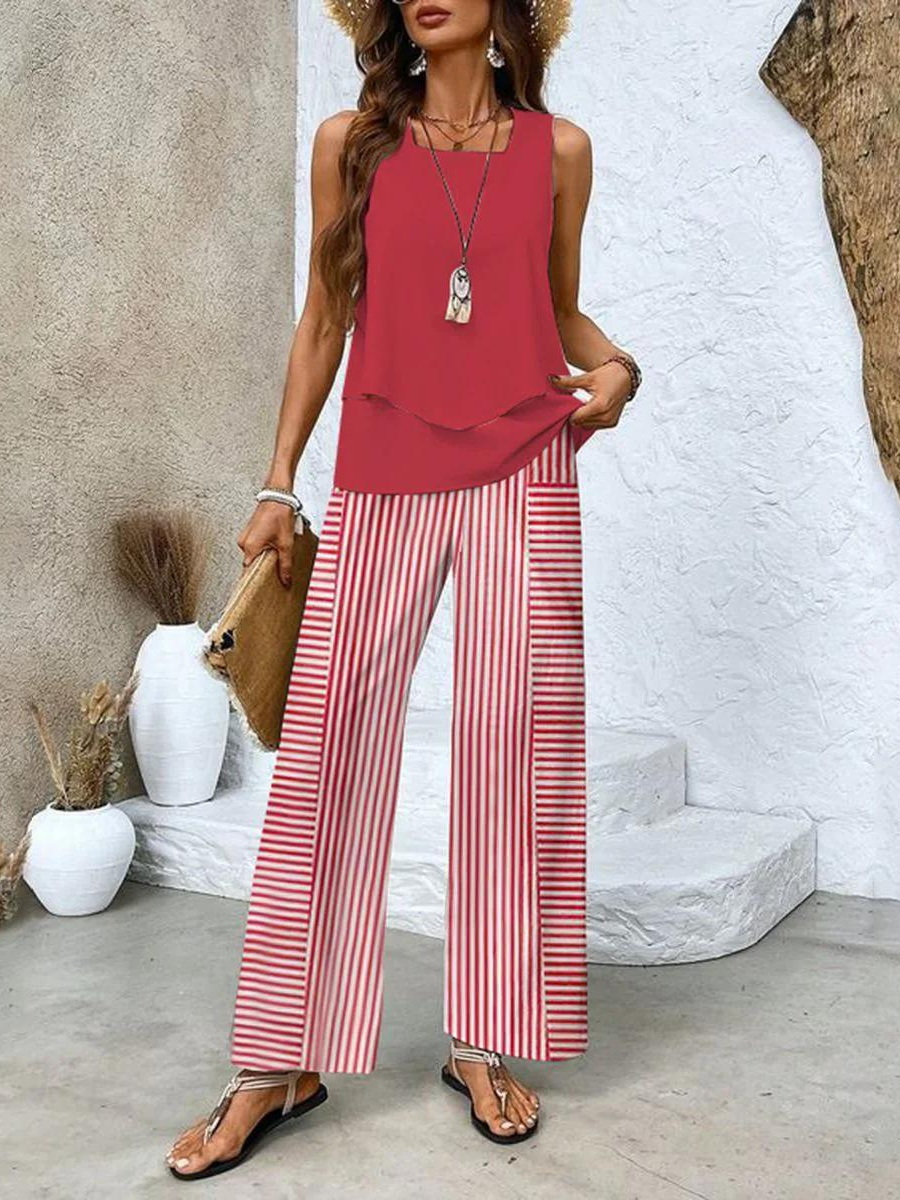 Alba | Conjunto de blusa e calça com estampa floral estilosa