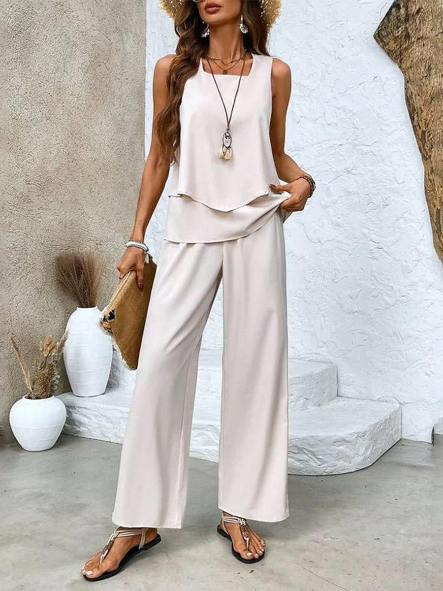 Alba | Conjunto de blusa e calça com estampa floral estilosa