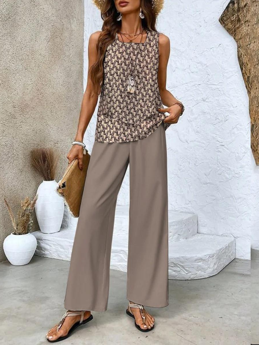Alba | Conjunto de blusa e calça com estampa floral estilosa